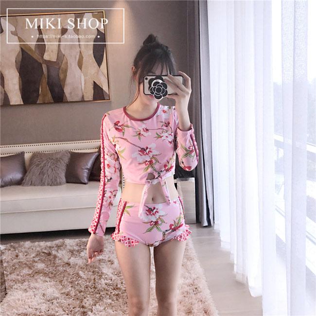 ngoc trinh gay bat ngo khi... mac ao tam "kin nhu bung" - 6