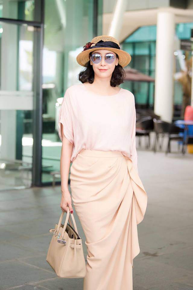 ao dai "sen vang" va vuong mien tien ty cua hoa hau h'hen nie noi nhat tuan - 8
